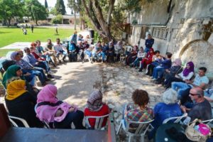 Adults circle from the Families Gathering of the Generations Club