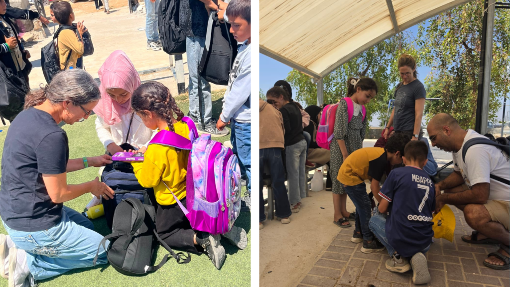 Parents Circle members helping Palestinian children with new school bags in Masafer Yatta